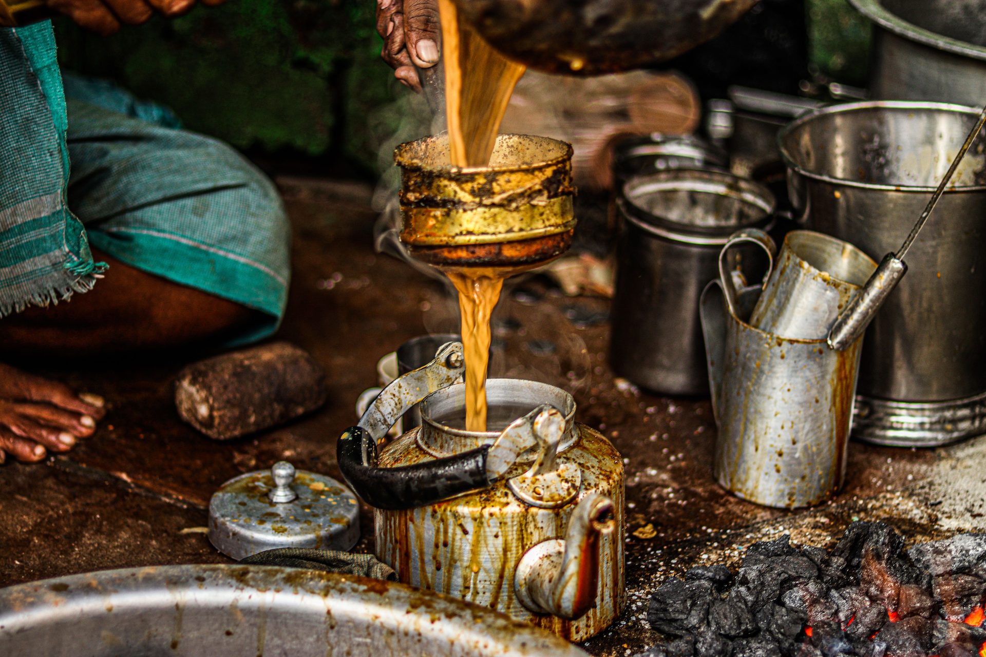 Modern homebrewer learning from traditional brewing elder