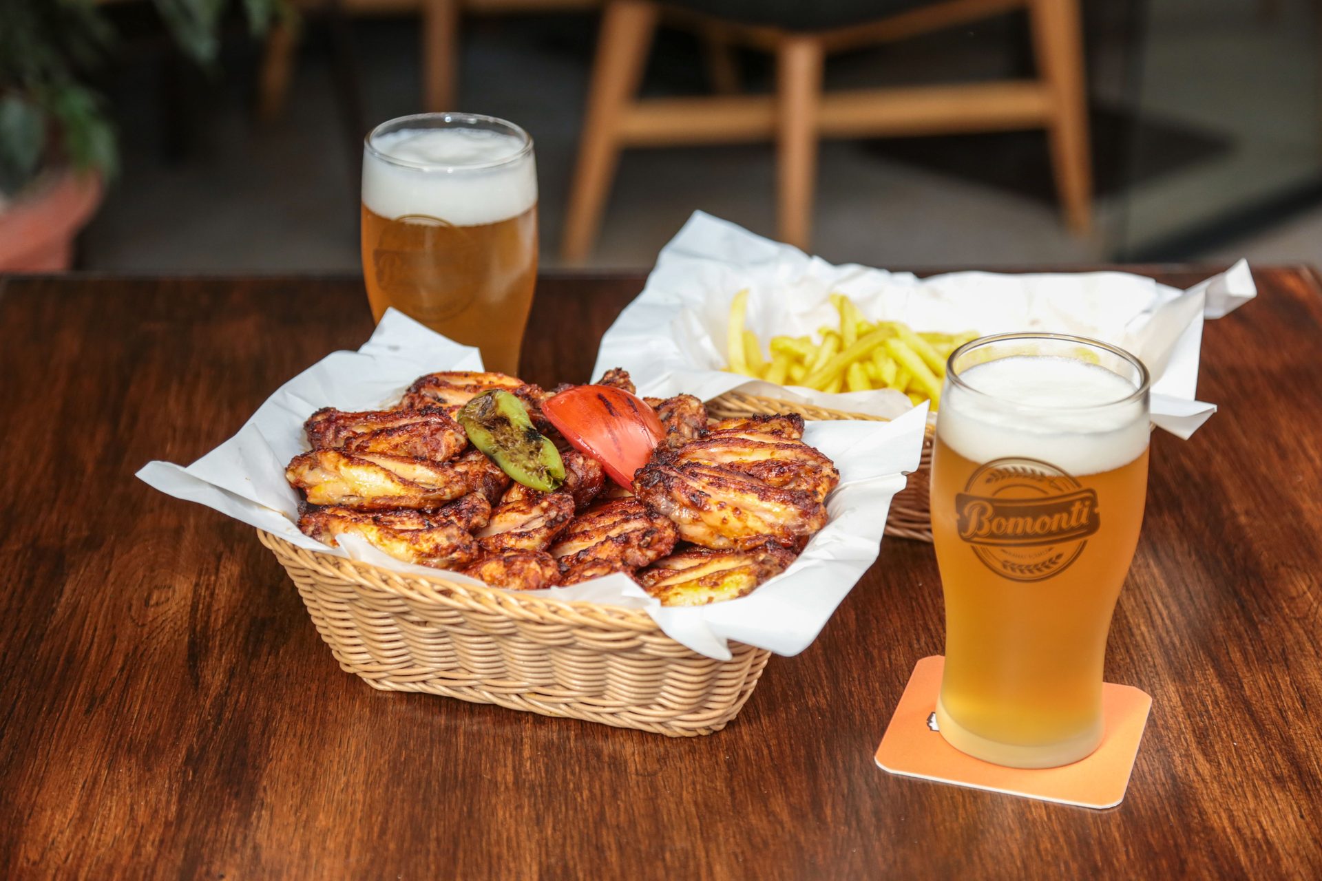 Grilled meats with craft IPA on braai table